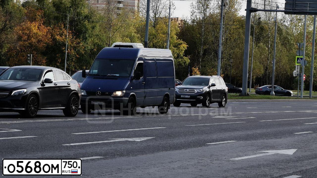 Фото автомобиля MAZDA CX-7, 2011 — госномер Н489ОМ32. Цвет: БЕЛЫЙ