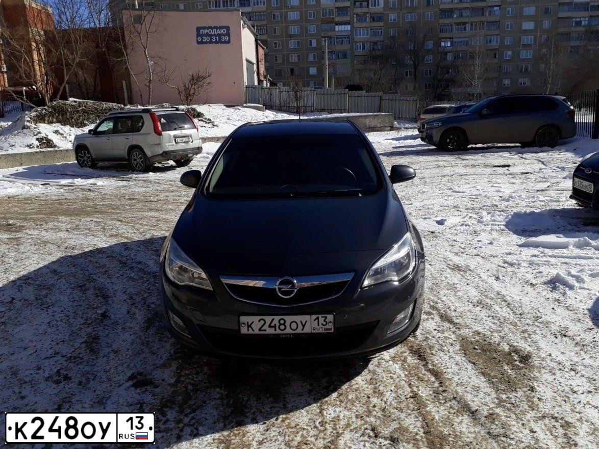 Фото автомобиля OPEL ASTRA, 2011 — госномер Е799НС13. Цвет: СЕРЫЙ МЕТАЛЛИК
