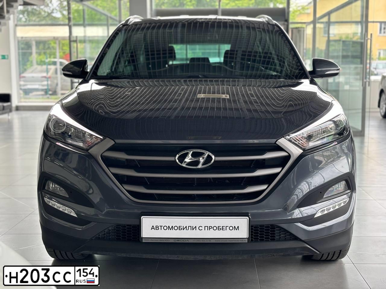 Фото автомобиля HYUNDAI TUCSON, 2018 — госномер Н203СС154. Цвет: Серый