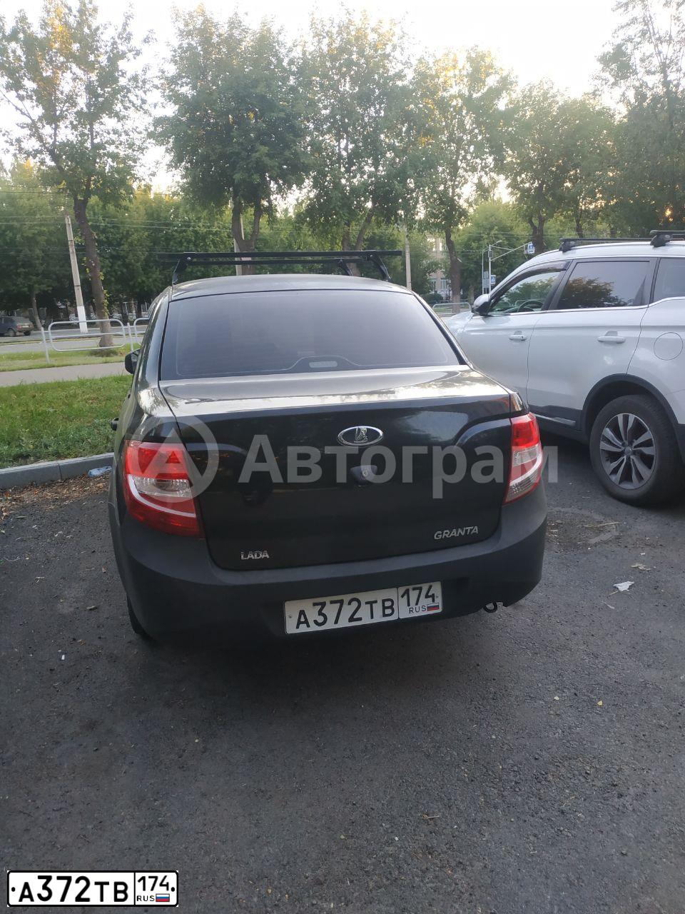 Фото автомобиля LADA 2190 GRANTA, 2014 — госномер А372ТВ174. Цвет: ЧЕРНЫЙ ТРЮФЕЛЬ