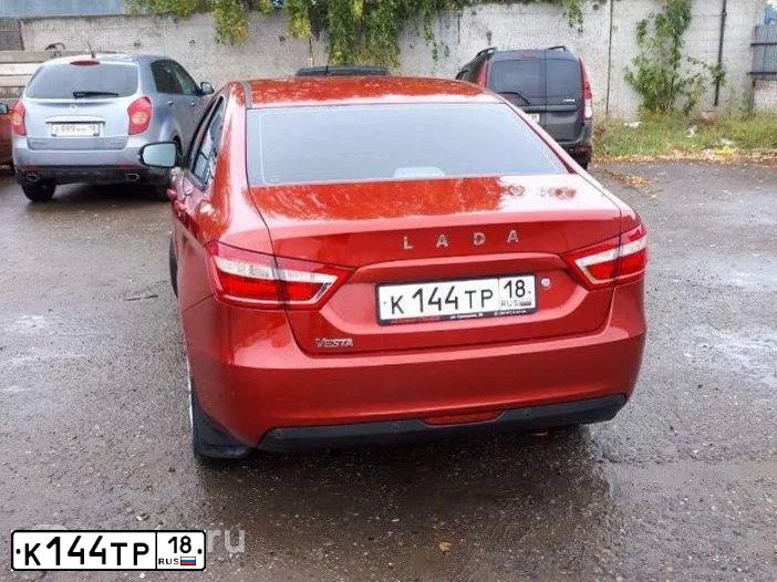 Фото автомобиля LADA VESTA, 2016 — госномер М004КУ159. Цвет: Красный