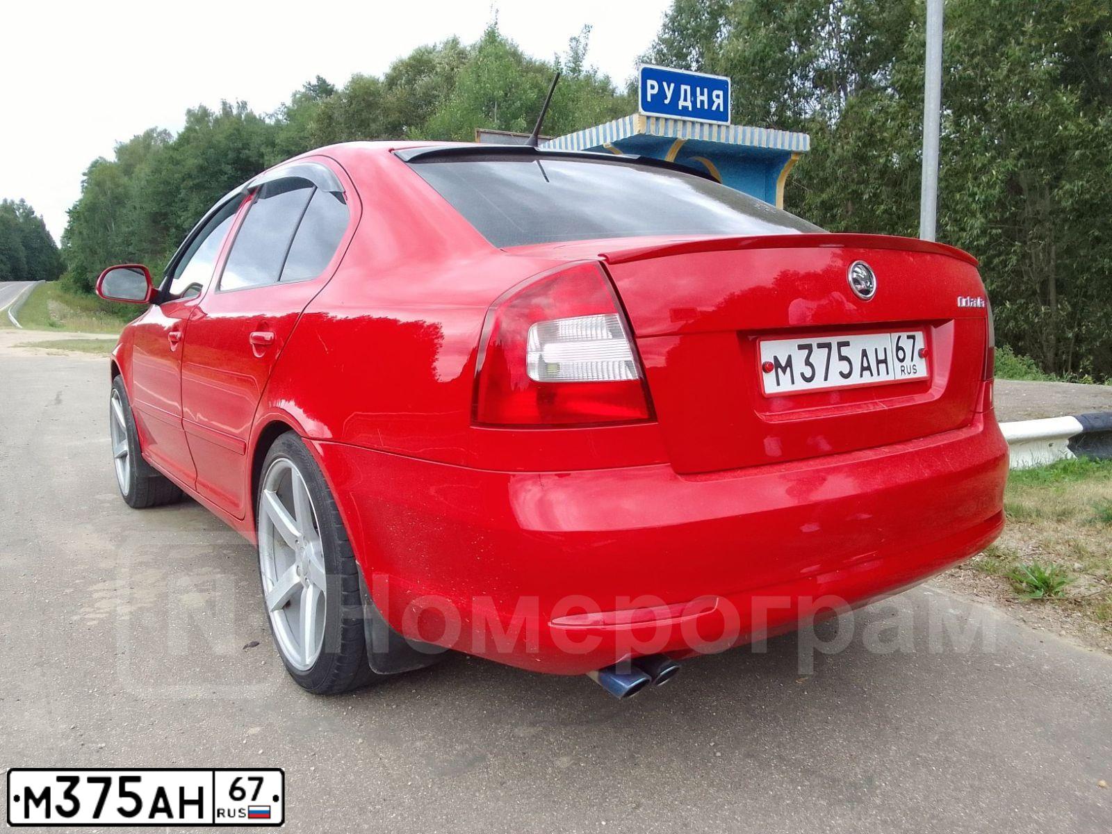 Фото автомобиля SKODA OCTAVIA, 2011 — госномер С292СС67. Цвет: Красный
