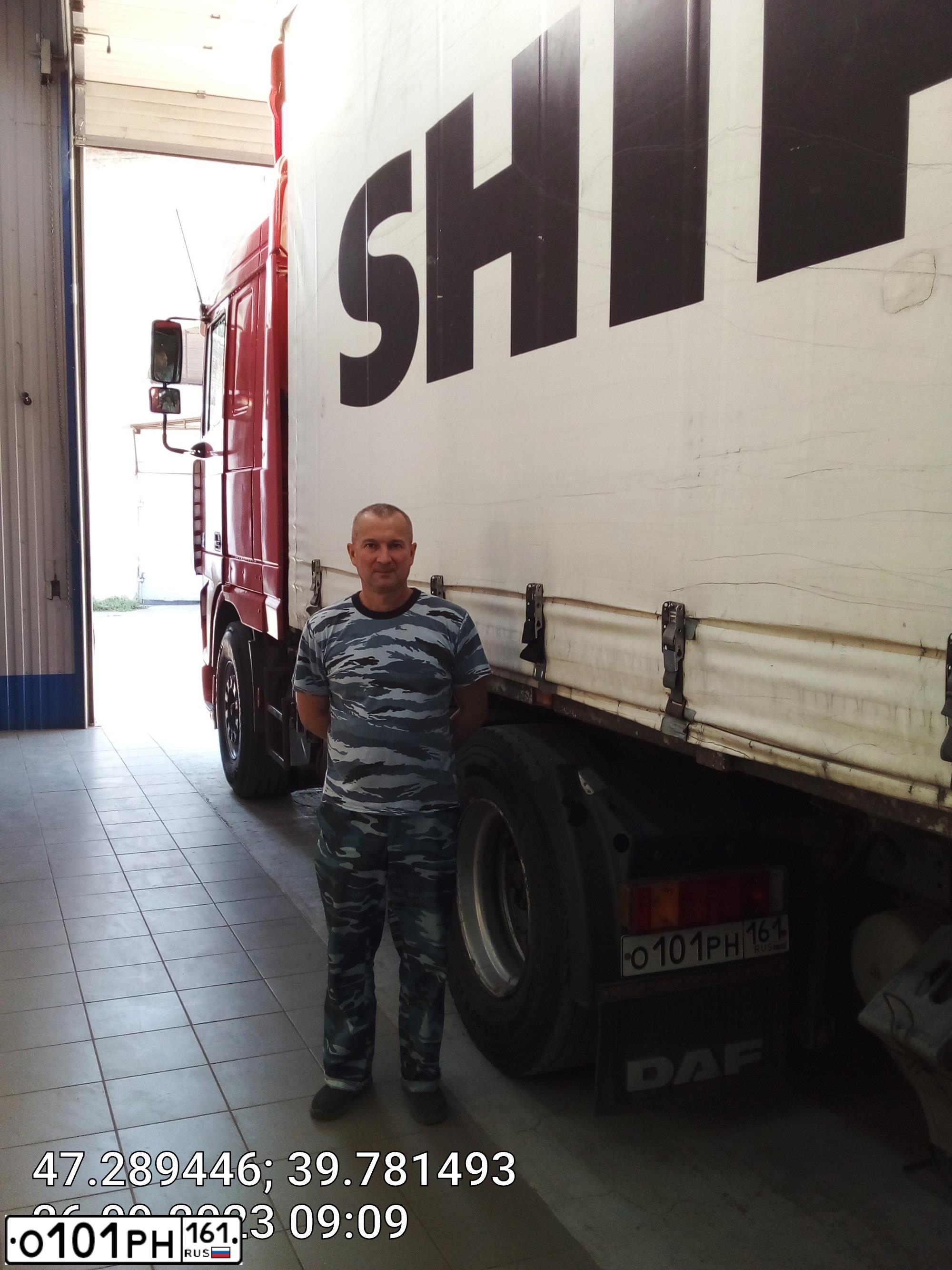 Фото автомобиля DAF F XF 95 FT 4X2, 2001 — госномер О101РН161. Цвет: КРАСНЫЙ