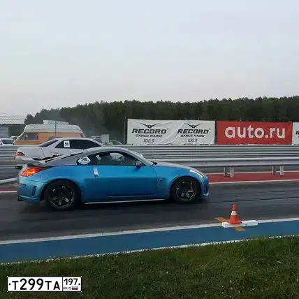 Фото автомобиля NISSAN 350 Z, 2003 — госномер Т299ТА197. Цвет: СЕРЫЙ