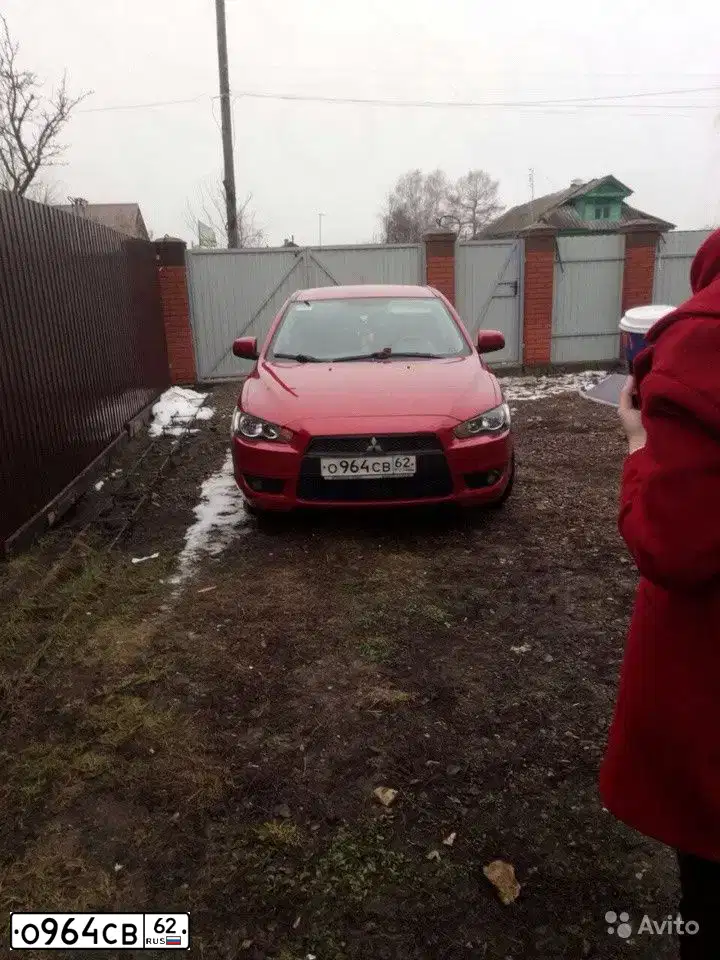Фото автомобиля MITSUBISHI LANCER, 2007 — госномер Х008НА62. Цвет: КРАСНЫЙ
