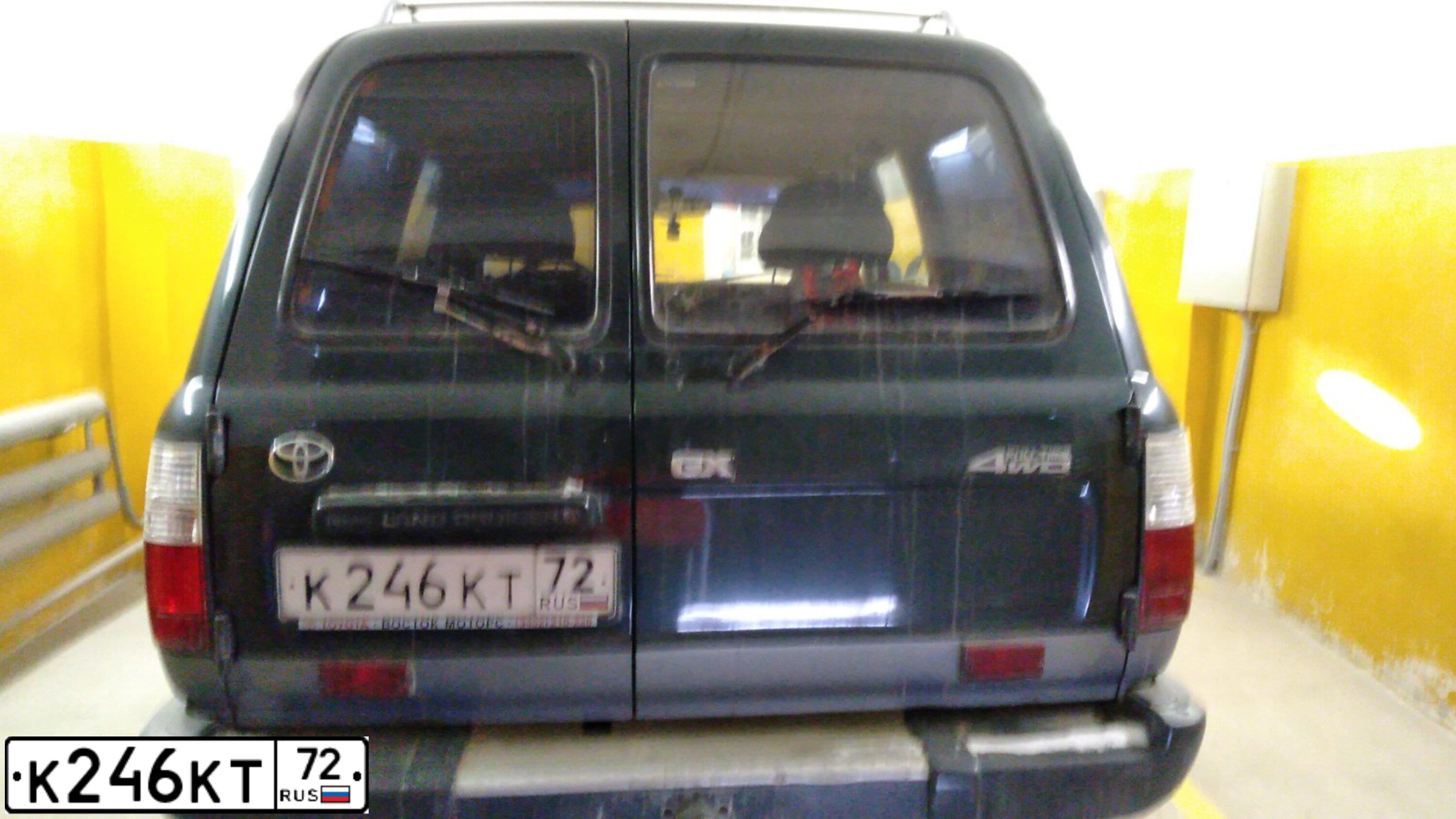 Фото автомобиля TOYOTA LANDCRUISER, 1997 — госномер К246КТ72. Цвет: БЕЛЫЙ