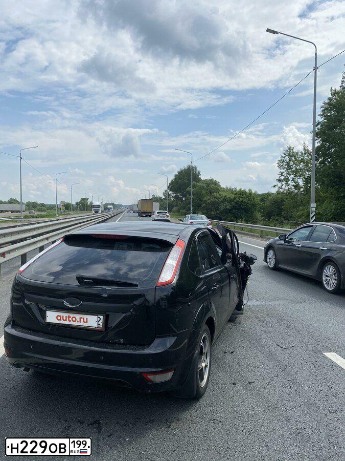 Фото автомобиля FORD FOCUS, 2008 — госномер Н229ОВ199. Цвет: ЧЕРНЫЙ