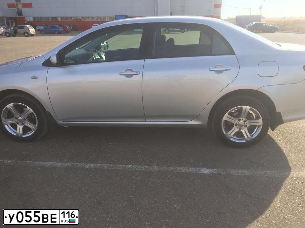 Фото автомобиля TOYOTA COROLLA, 2006 — госномер У055ВЕ116. Цвет: серебристый
