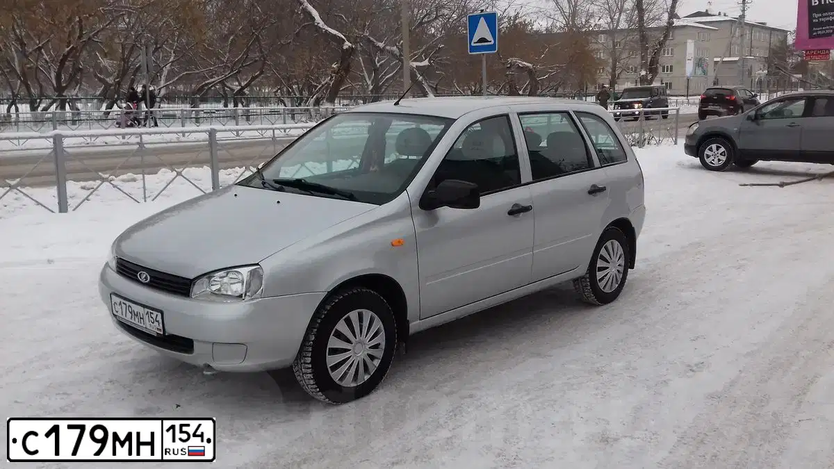 Фото автомобиля LADA KALINA, 2012 — госномер А091АХ155. Цвет: СЕРЕБРИСТЫЙ