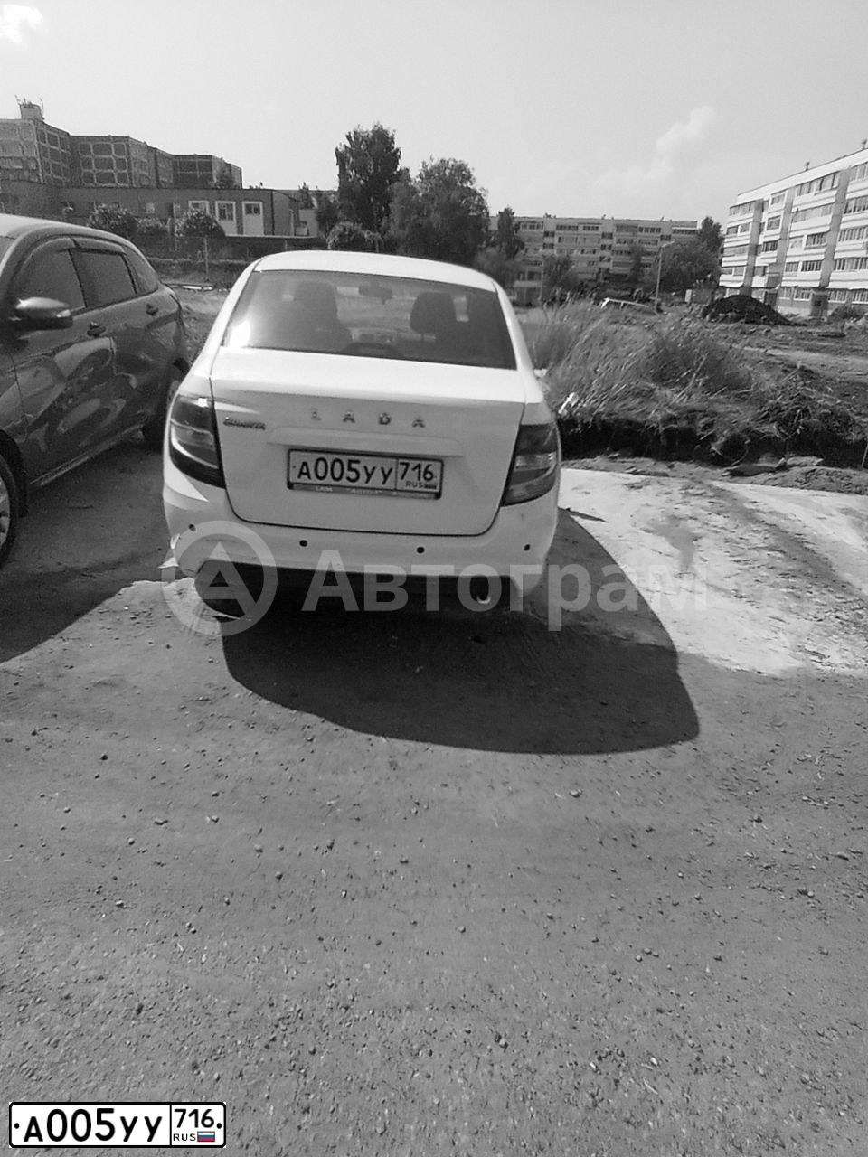 Фото автомобиля LADA 2190 GRANTA, 2018 — госномер А005УУ716. Цвет: БЕЛЫЙ