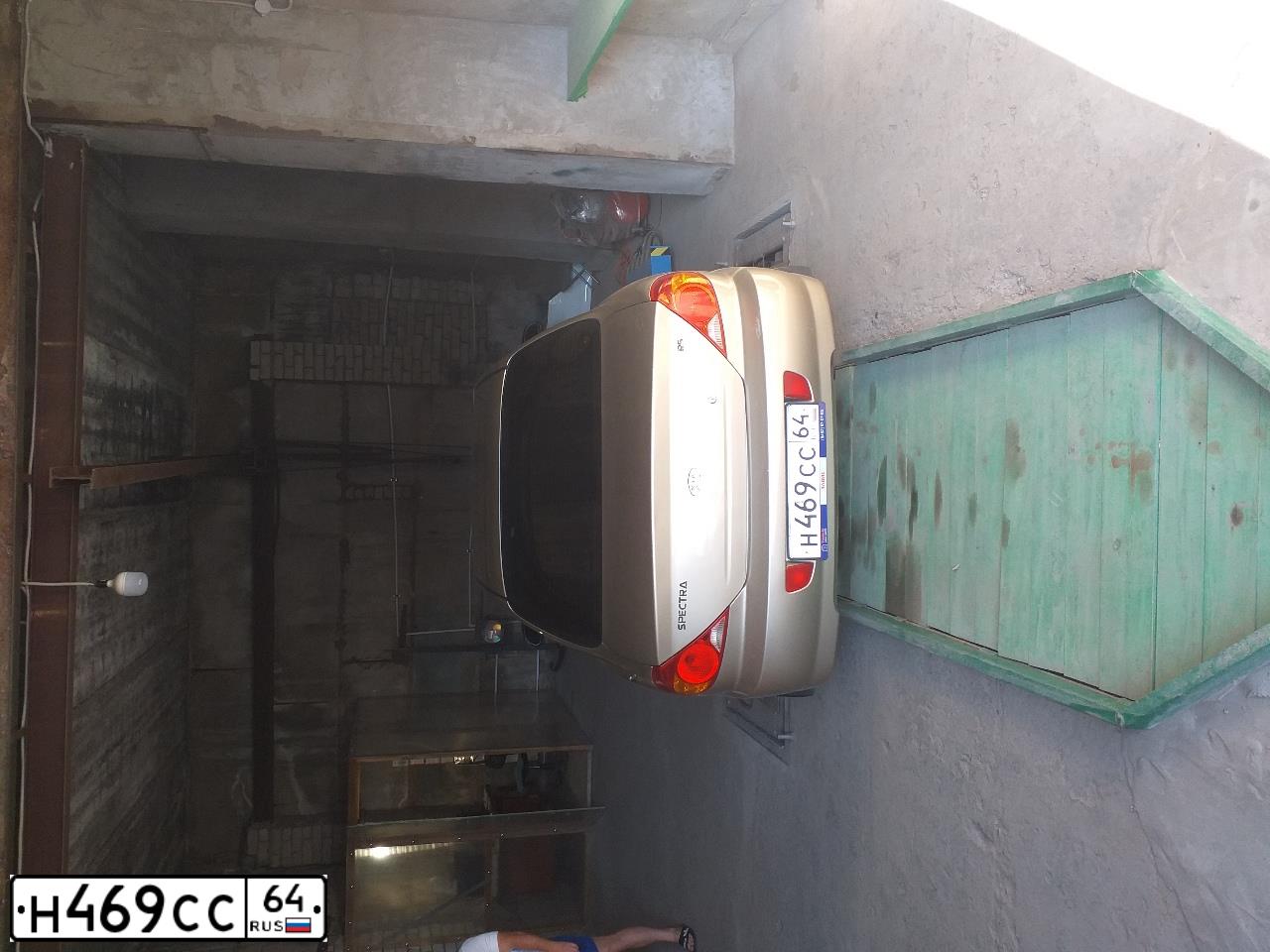 Фото автомобиля KIA SPECTRA, 2008 — госномер Н469СС64. Цвет: БЕЖЕВЫЙ