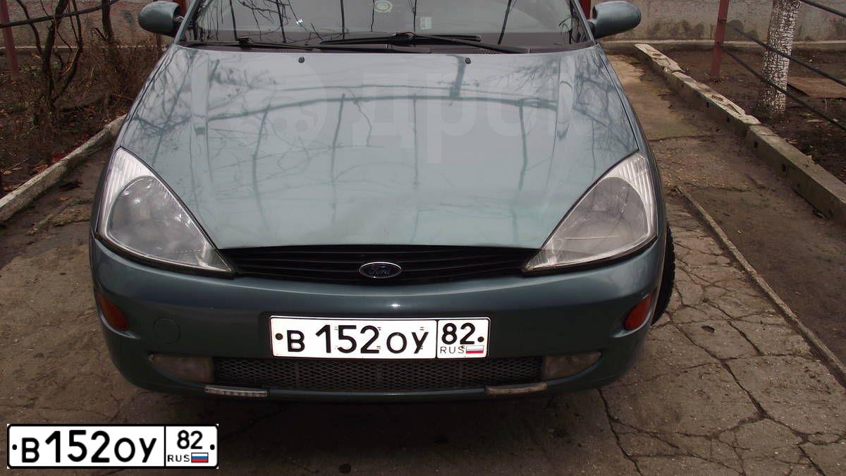 Фото автомобиля FORD FOCUS, 1999 — госномер В152ОУ82. Цвет: СВЕТЛО-ЗЕЛЕНЫЙ