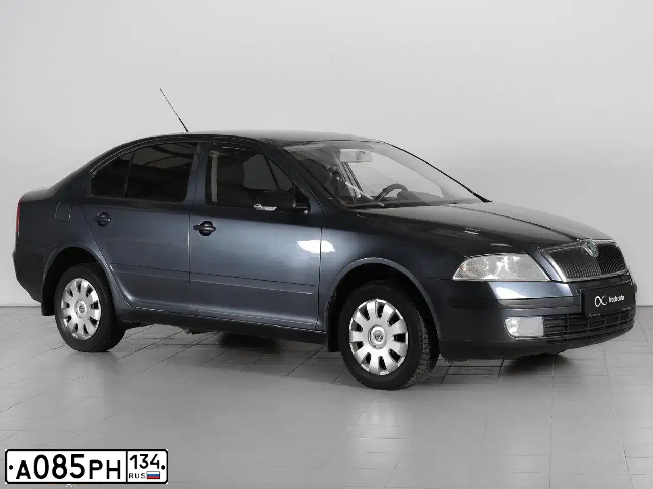 Фото автомобиля LADA KALINA, 2013 — госномер К714ОЕ30. Цвет: Белый