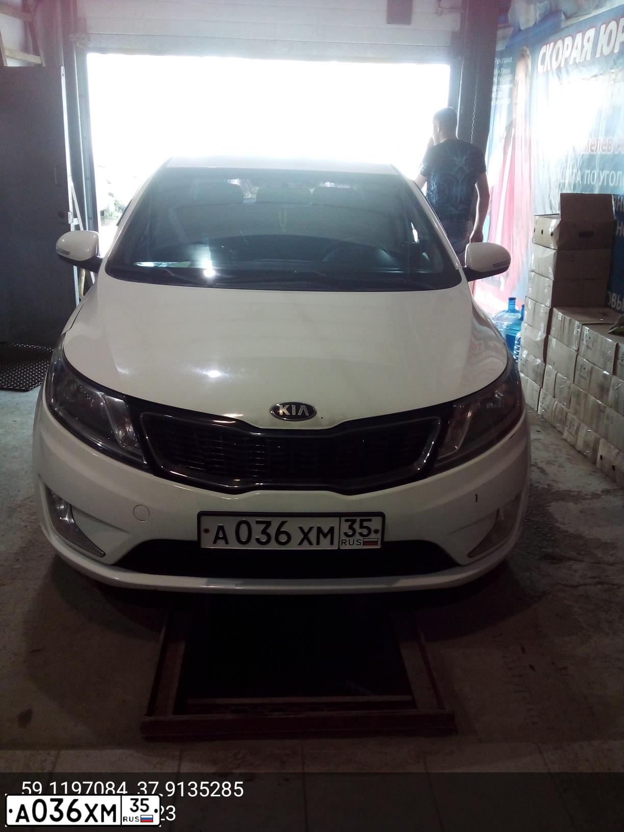 Фото автомобиля CHEVROLET AVEO, 2009 — госномер Е148КС35. Цвет: СЕРЫЙ