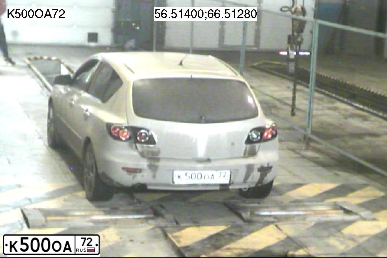 Фото автомобиля MAZDA 3, 2006 — госномер Х592СР72. Цвет: СЕРО-ЗОЛОТИСТЫЙ