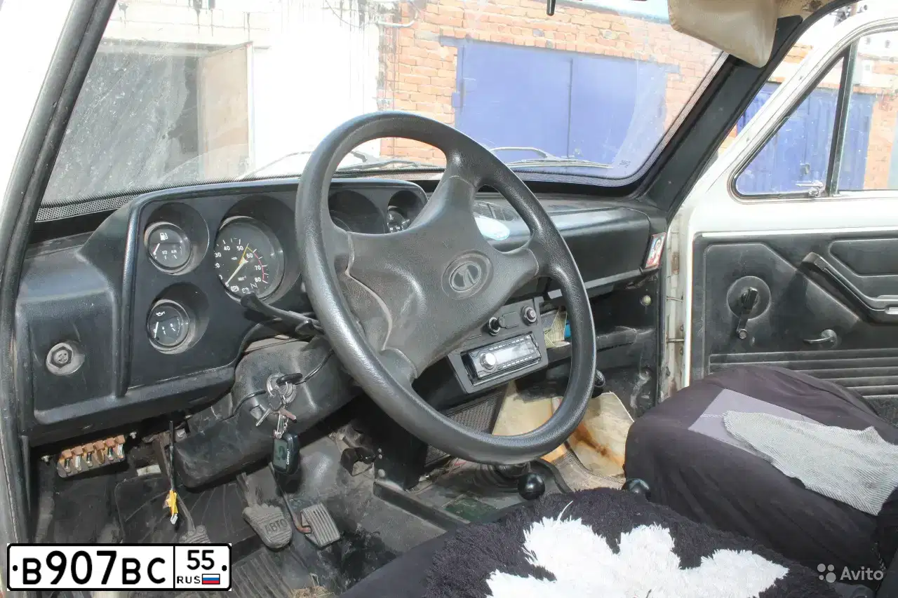 Фото автомобиля LADA 2121 NIVA, 1989 — госномер Т993МН55. Цвет: СЕРО-БЕЛЫЙ