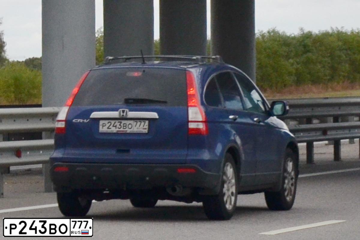 Фото автомобиля HONDA CR-V, 2009 — госномер Р243ВО777. Цвет: СИНИЙ