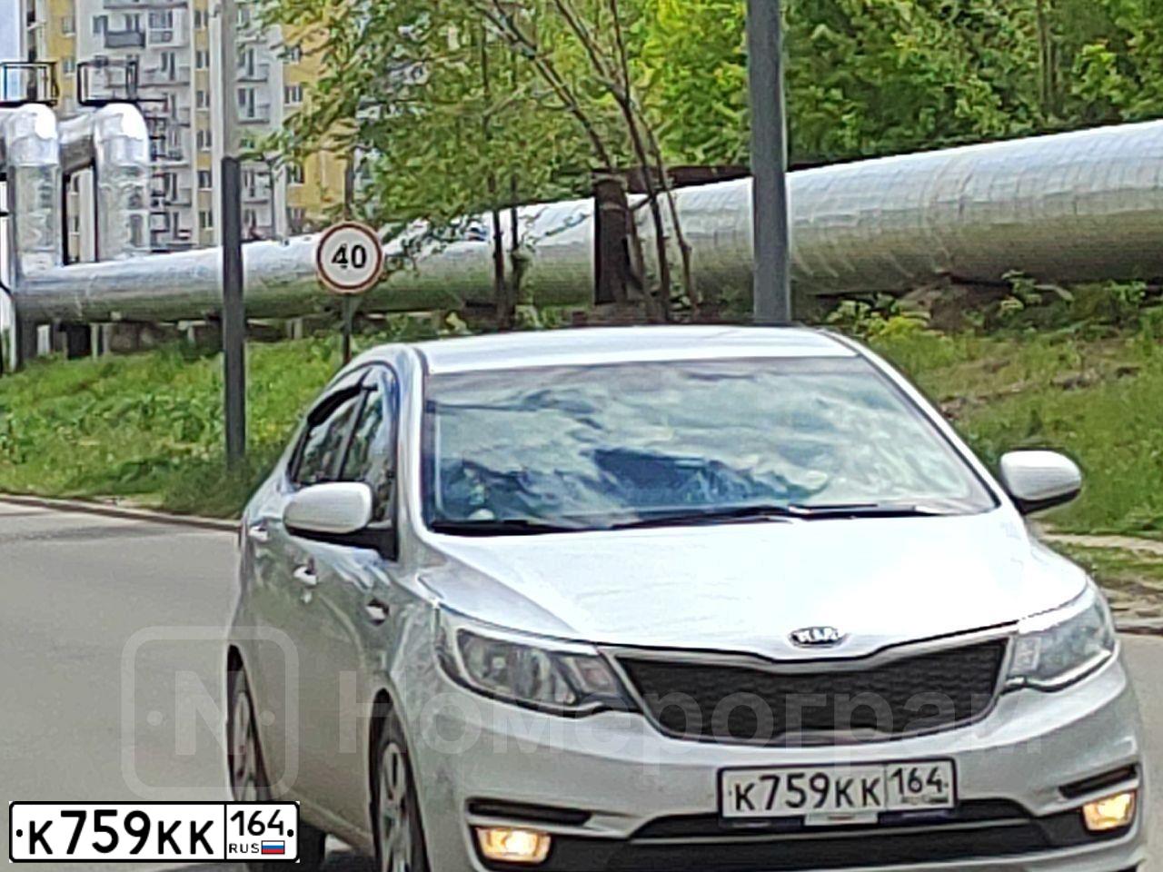 Фото автомобиля KIA RIO, 2016 — госномер К759КК164. Цвет: СЕРЕБРИСТЫЙ