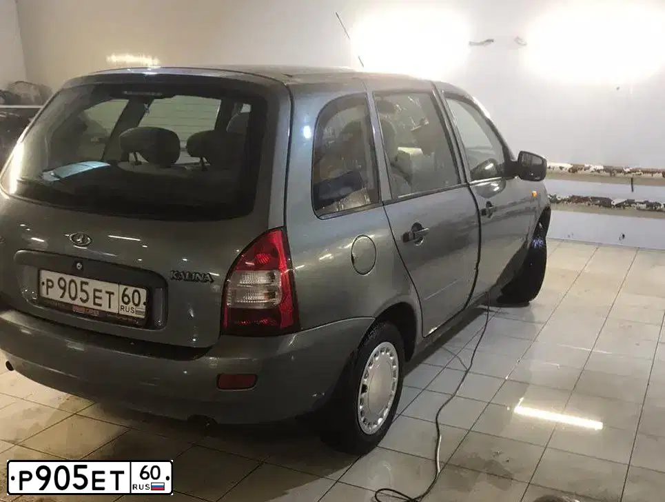 Фото автомобиля LADA 1117 KALINA, 2011 — госномер О824АА797. Цвет: ТЕМНО СЕРЫЙ