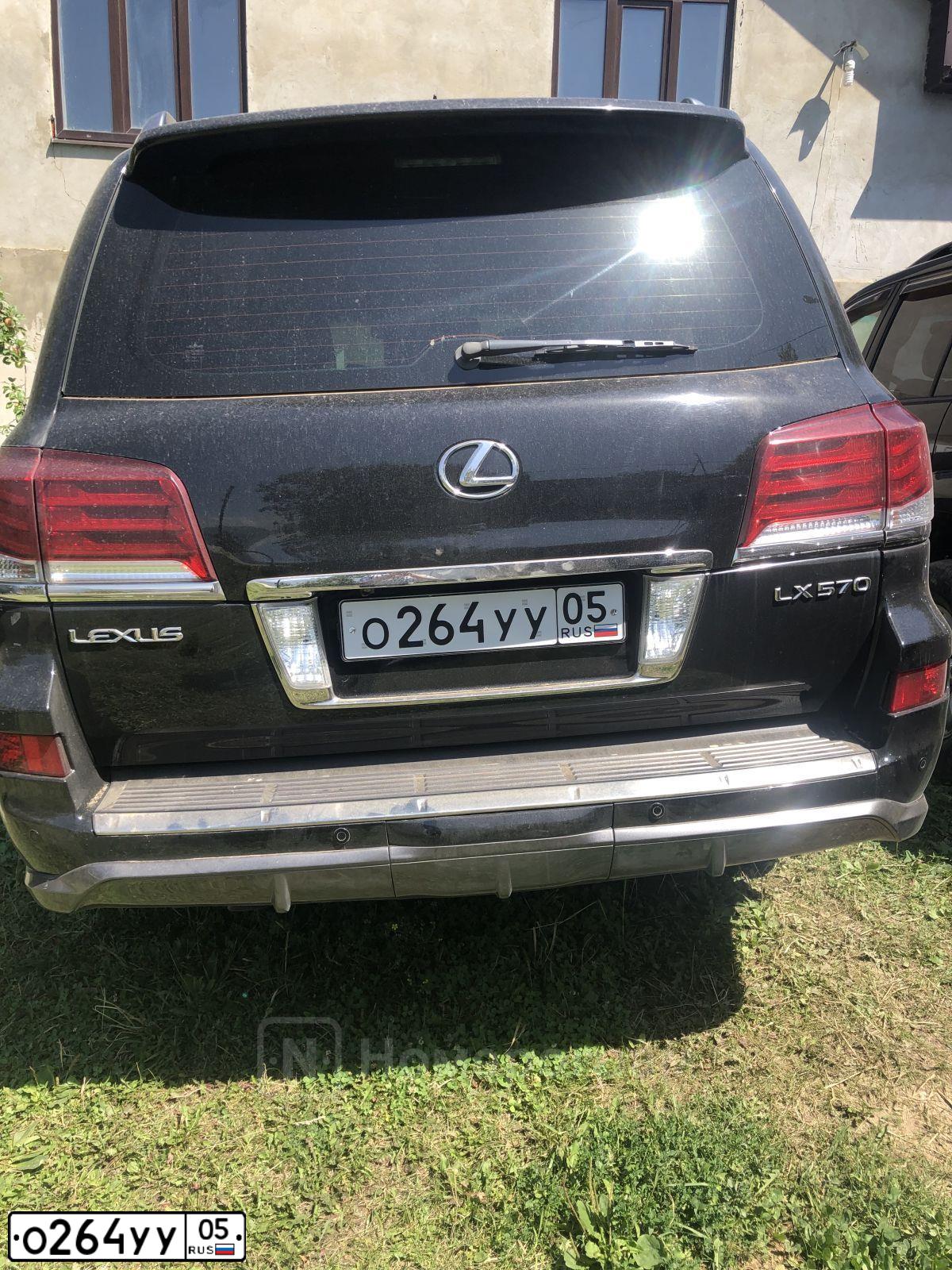 Фото автомобиля LEXUS LX, 2012 — госномер О006АА09. Цвет: ЧЕРНЫЙ
