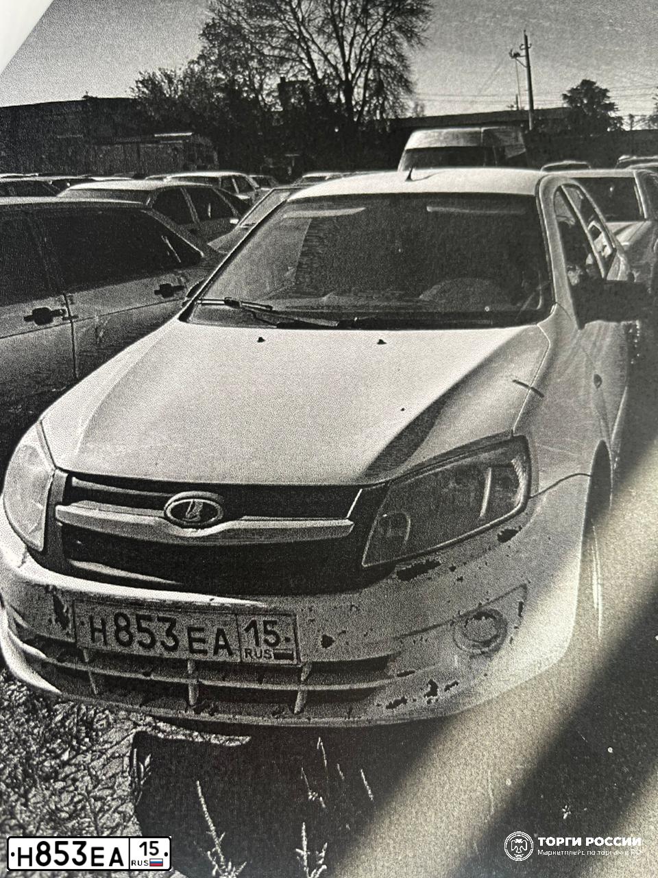 Фото автомобиля LADA 2190 GRANTA, 2014 — госномер Н853ЕА15. Цвет: Белый