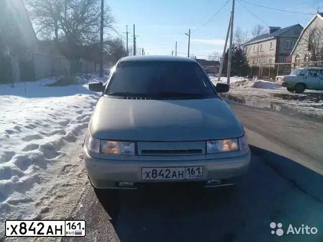 Фото автомобиля LADA 2110, 2000 — госномер Е077ВР761. Цвет: ЖЕЛТЫЙ