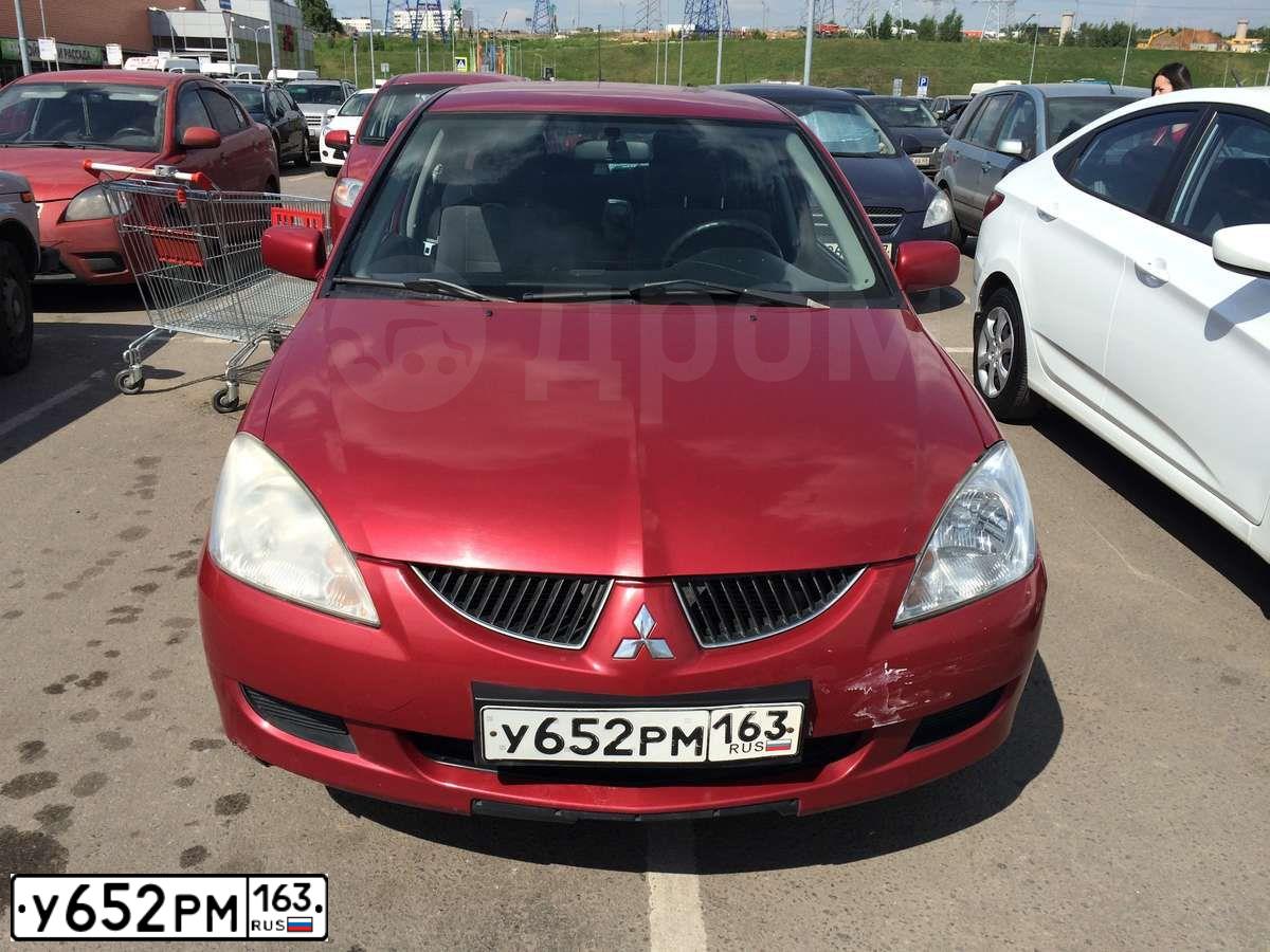 Фото автомобиля MITSUBISHI LANCER, 2003 — госномер К001СВ63. Цвет: КРАСНЫЙ