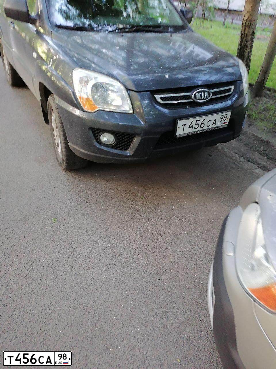 Фото автомобиля KIA SPORTAGE, 2009 — госномер Т456СА98. Цвет: Серый