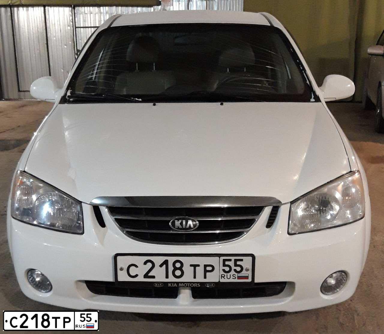 Фото автомобиля KIA CERATO, 2004 — госномер А380СР86. Цвет: Белый