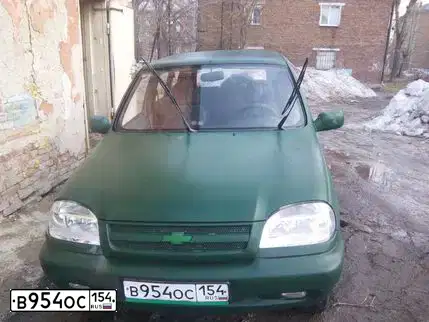 Фото автомобиля CHEVROLET T NIVA, 2005 — госномер В954ОС154. Цвет: ТЕМНО ЗЕЛЕНЫЙ