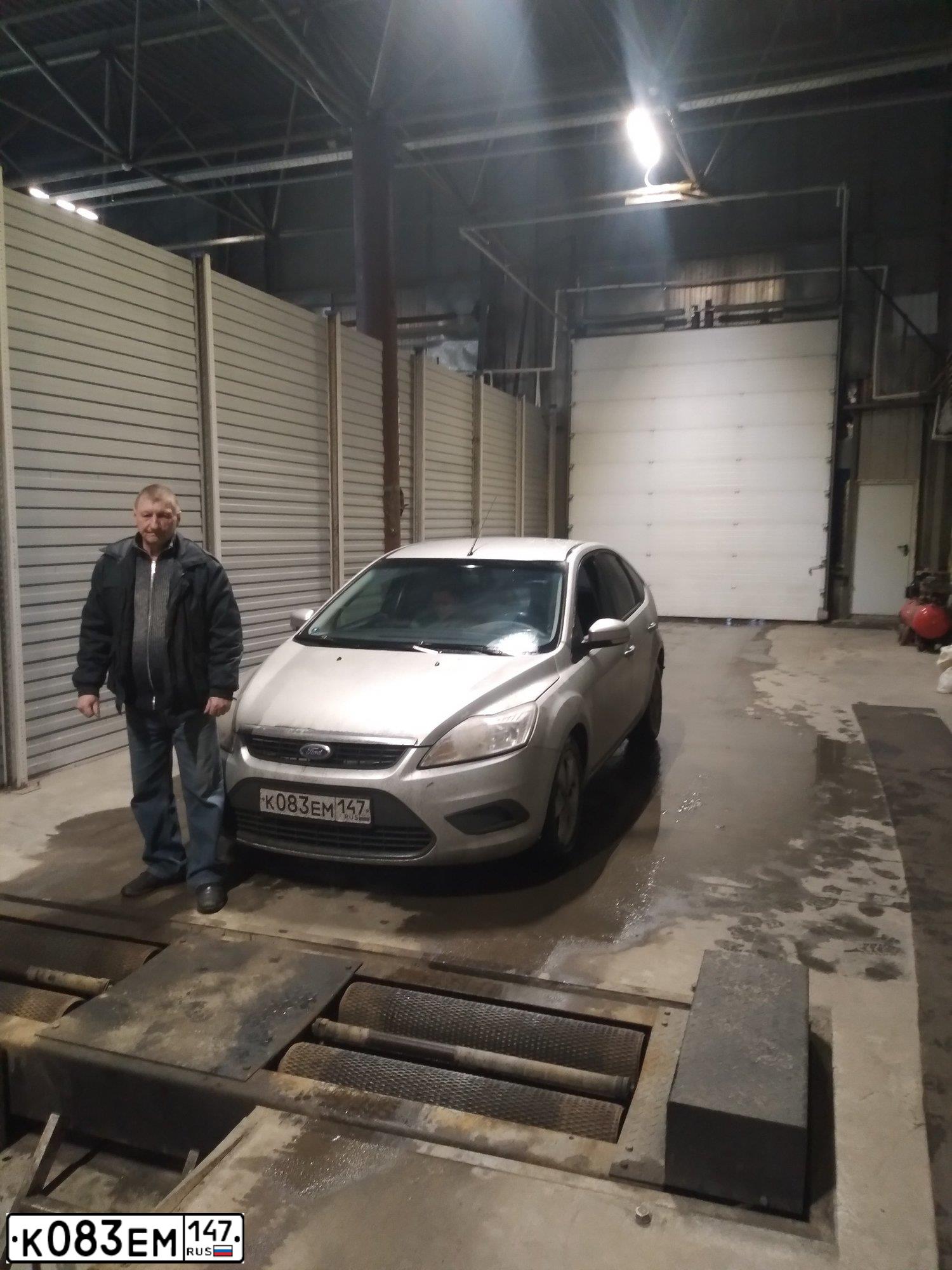 Фото автомобиля FORD FOCUS, 2010 — госномер С161ОВ198. Цвет: Серебристый
