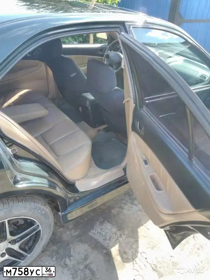 Фото автомобиля MITSUBISHI GALANT, 1998 — госномер М758УС36. Цвет: ЗЕЛЕНЫЙ