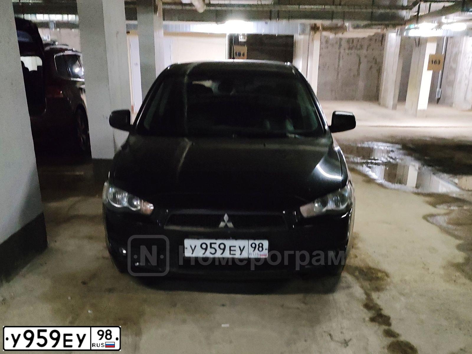 Фото автомобиля MITSUBISHI LANCER, 2008 — госномер У959ЕУ98. Цвет: ЧЕРНЫЙ