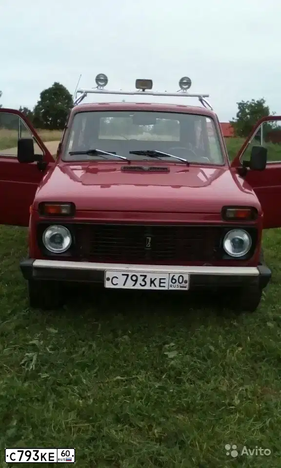 Фото автомобиля LADA 2121 NIVA, 1990 — госномер Н218НЕ53. Цвет: КРАСНЫЙ