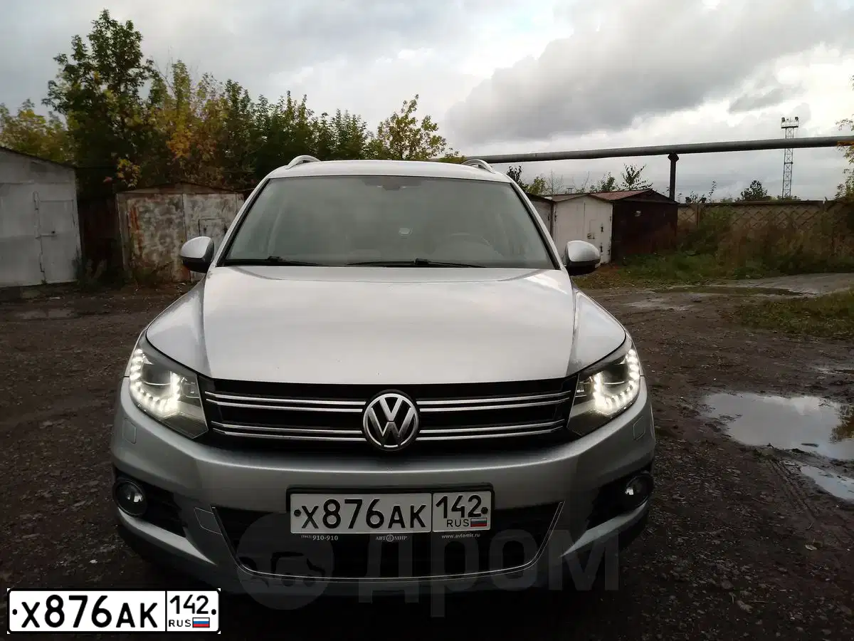 Фото автомобиля VOLKSWAGEN TIGUAN, 2011 — госномер Р150ЕК193. Цвет: СЕРЕБРИСТЫЙ