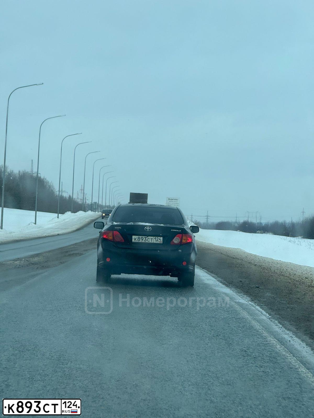 Фото автомобиля TOYOTA COROLLA, 2006 — госномер К893СТ124. Цвет: ЧЕРНЫЙ