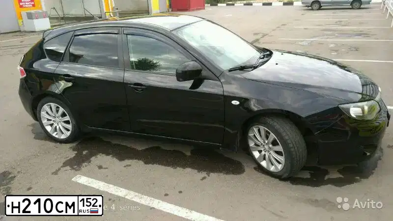 Фото автомобиля SUBARU IMPREZA, 2007 — госномер Н210СМ152. Цвет: ЧЕРНЫЙ