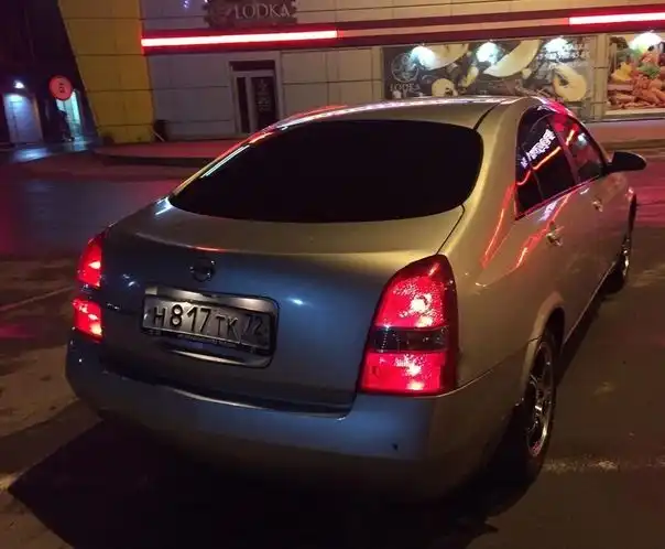 Фото автомобиля NISSAN PRIMERA NISSAN PRIMERA, 2001 — госномер К435ХМ186. Цвет: Серый