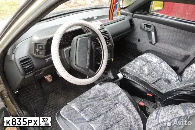 Фото автомобиля LADA 2110, 2001 — госномер К835РХ32. Цвет: СВЕТЛО-ЗЕЛЕНЫЙ