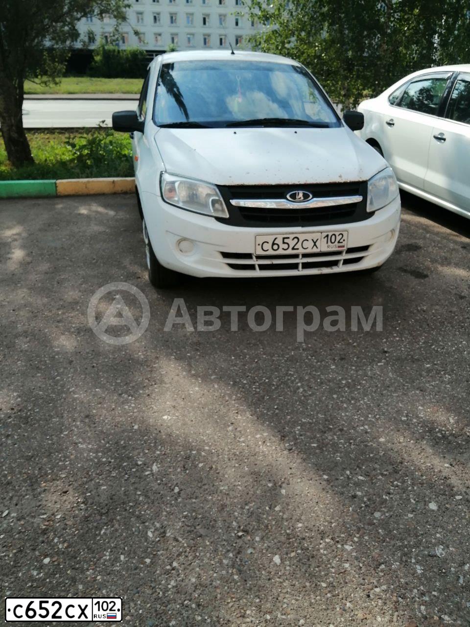 Фото автомобиля LADA 2190 GRANTA, 2012 — госномер К113КХ702. Цвет: Белый