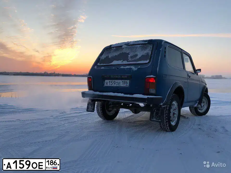 Фото автомобиля LADA 2121 NIVA, 1999 — госномер А159ОЕ186. Цвет: ЗЕЛЕНЫЙ