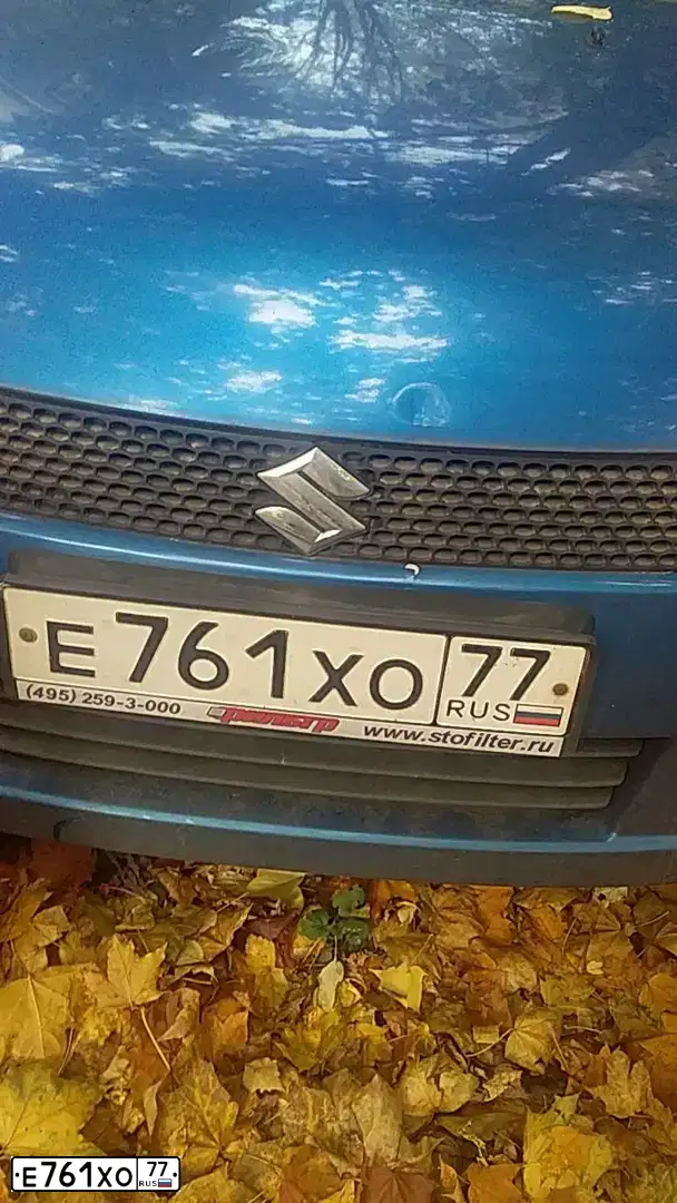 Фото автомобиля SUZUKI SWIFT, 2006 — госномер Е761ХО77. Цвет: СИНИЙ