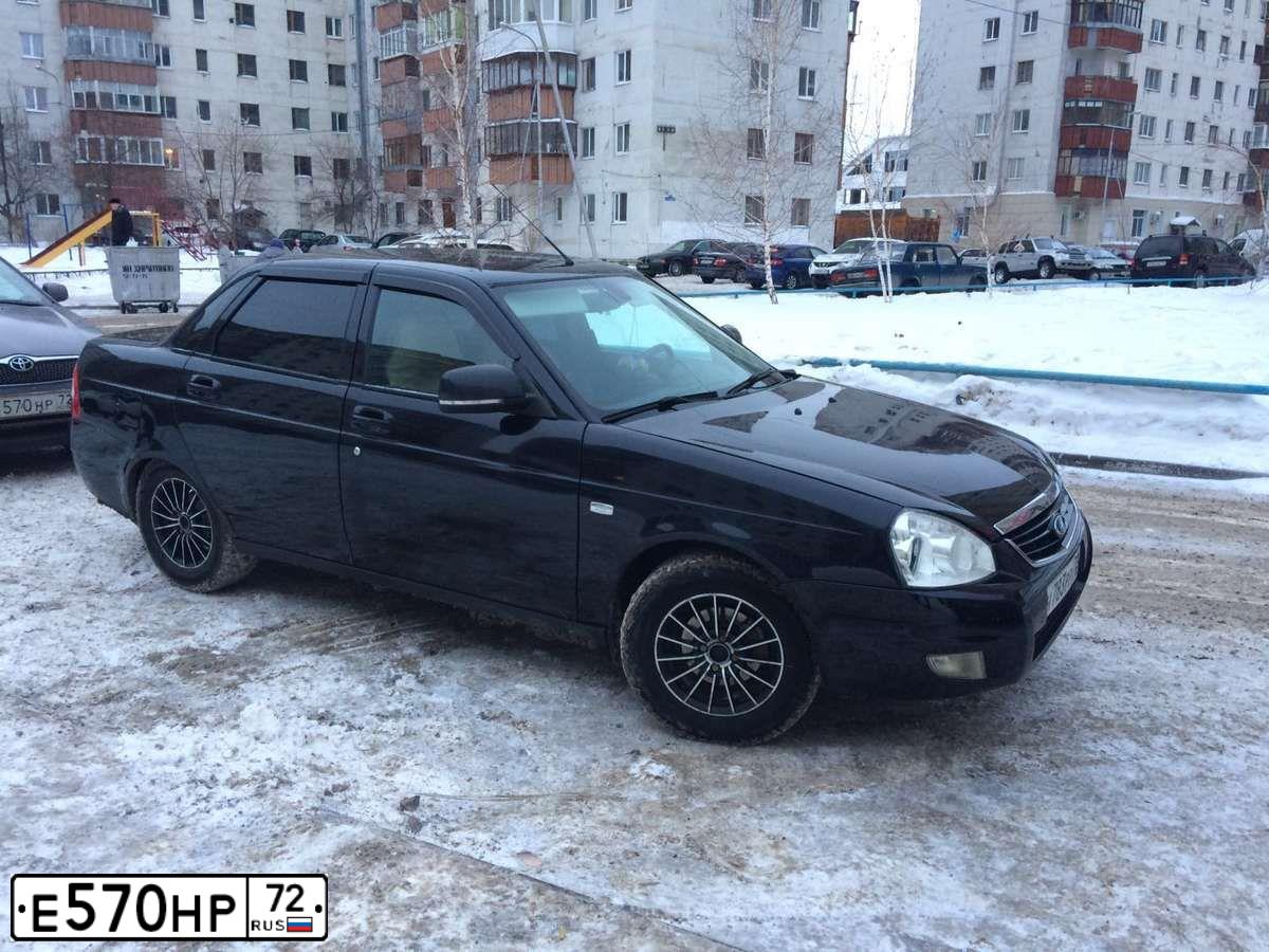Фото автомобиля FORD FOCUS, 2006 — госномер Е570НР72. Цвет: СЕРЕБРИСТЫЙ
