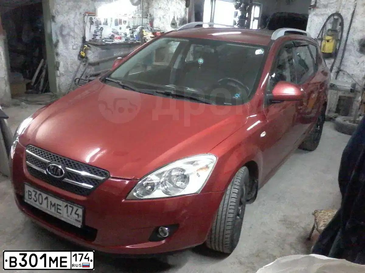 Фото автомобиля KIA CEE'D, 2009 — госномер В301МЕ174. Цвет: Красный