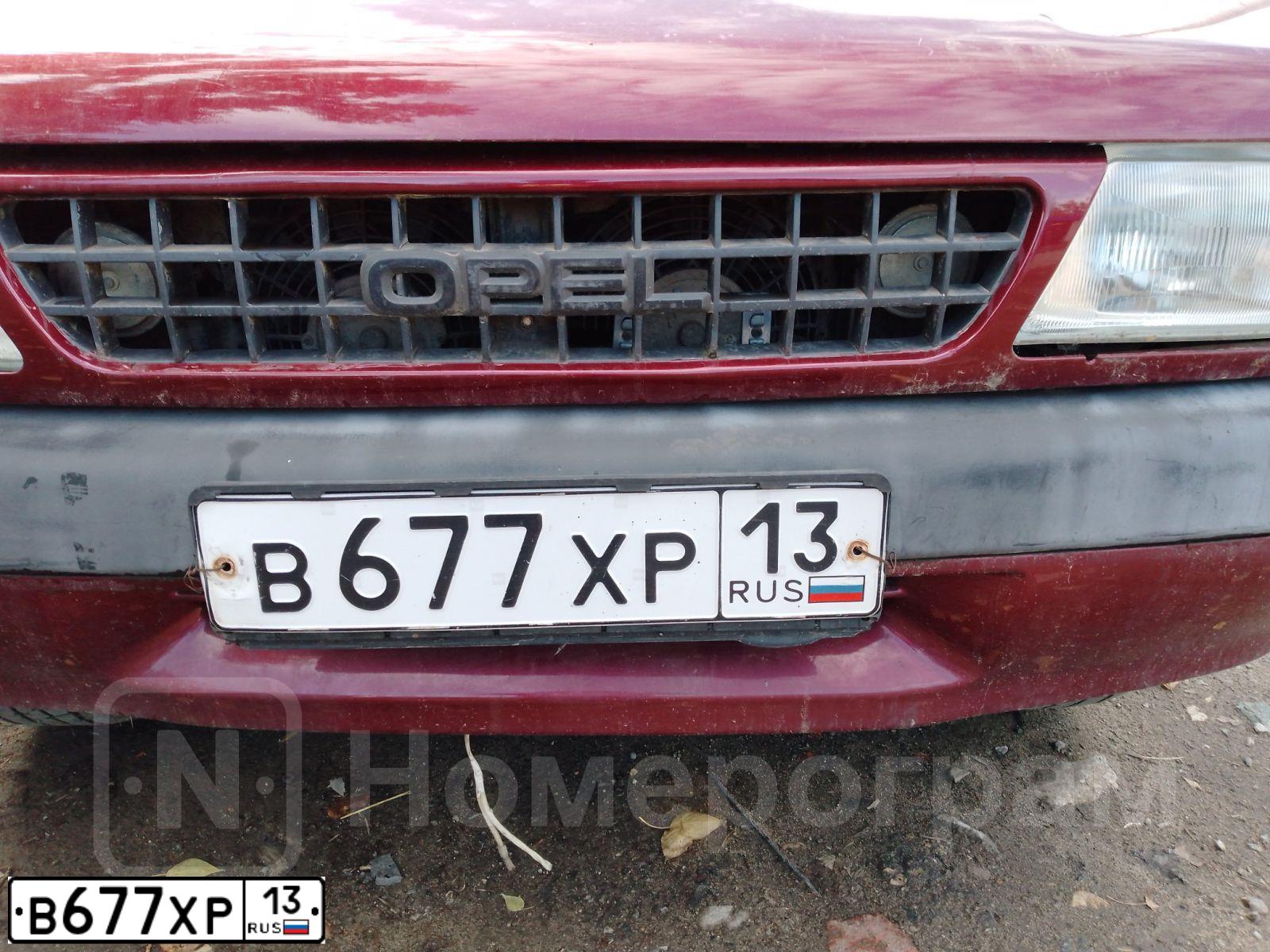 Фото автомобиля OPEL FRONTERA, 1992 — госномер М780МС13. Цвет: ТЕМНО-КРАСНЫЙ