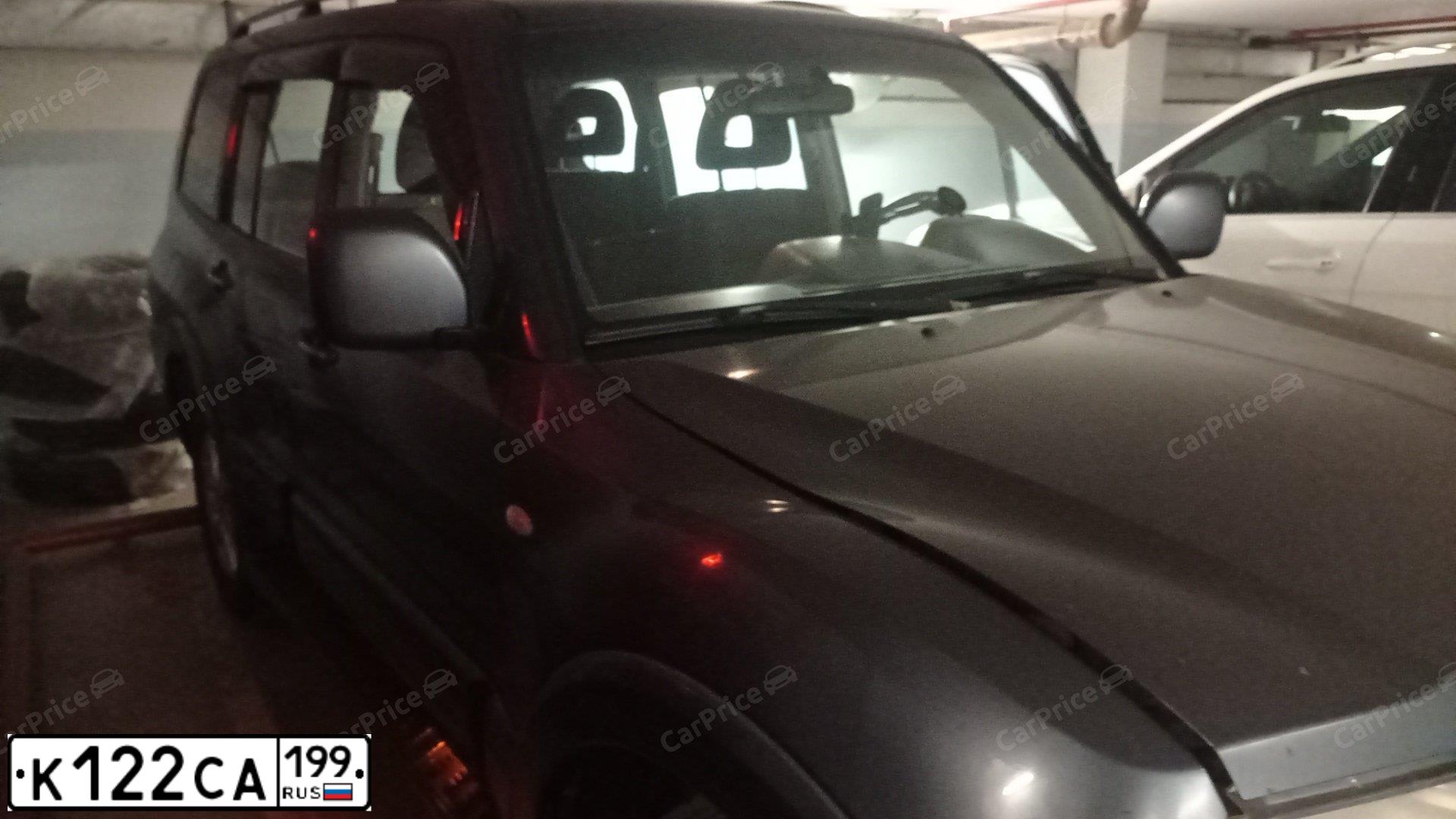 Фото автомобиля MITSUBISHI PAJERO, 2006 — госномер О612АА550. Цвет: СЕРЫЙ