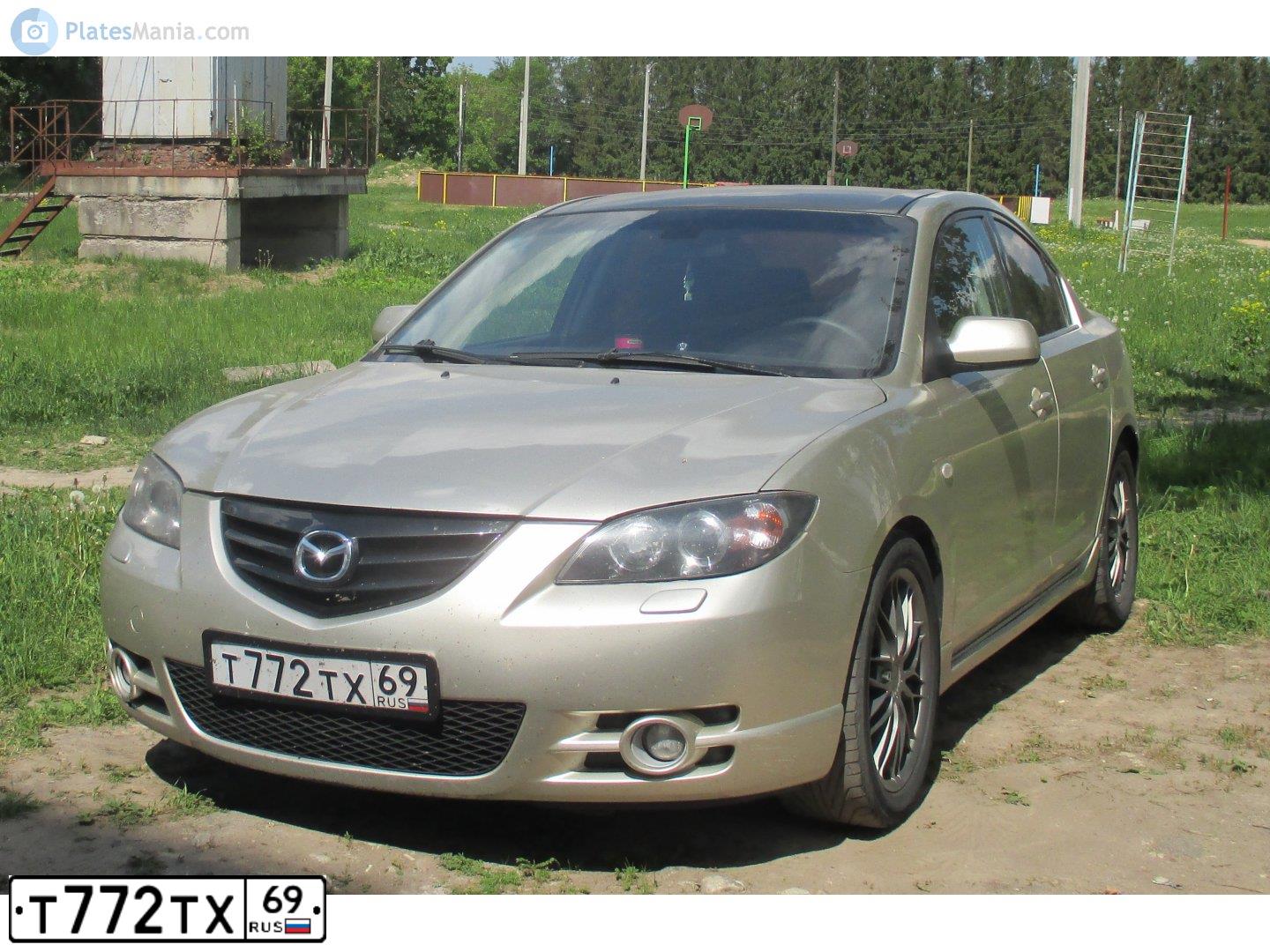 Фото автомобиля MAZDA 3, 2006 — госномер М175УВ198. Цвет: СЕРО-ЗОЛОТИСТЫЙ