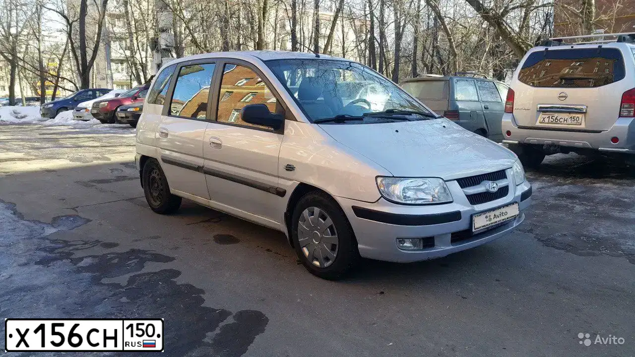 Фото автомобиля NISSAN X-TRAIL, 2008 — госномер Е149ТВ125. Цвет: СЕРЫЙ
