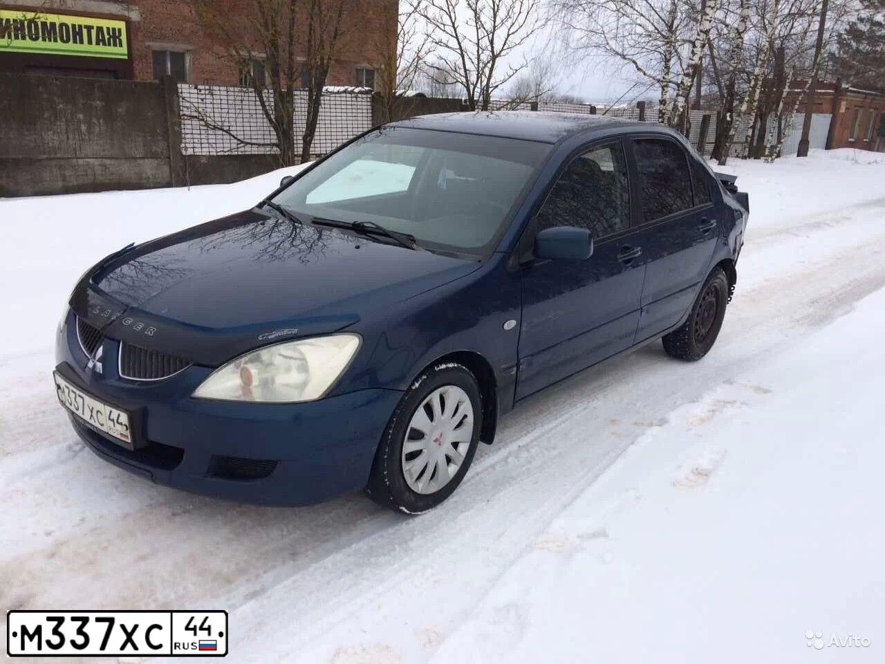Фото автомобиля MITSUBISHI LANCER, 2005 — госномер О532НТ67. Цвет: синий