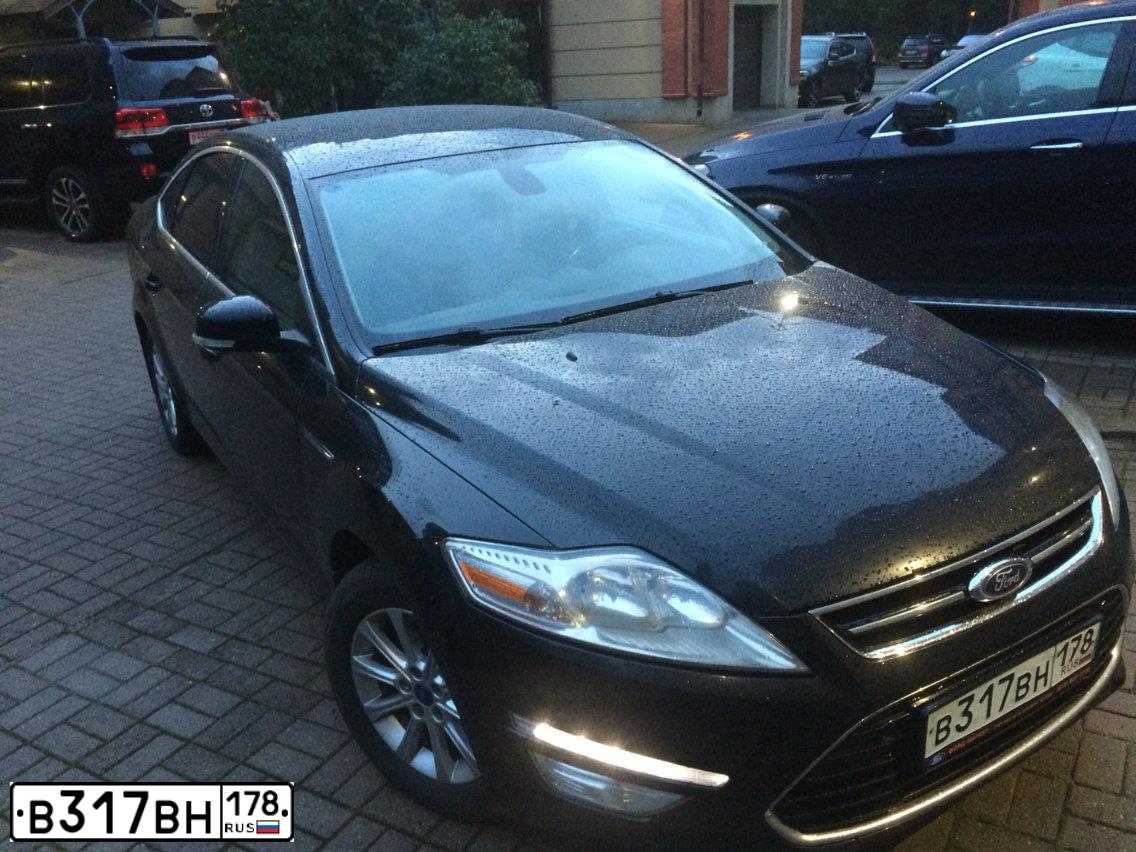 Фото автомобиля FORD MONDEO, 2011 — госномер К053МУ35. Цвет: ЧЕРНЫЙ